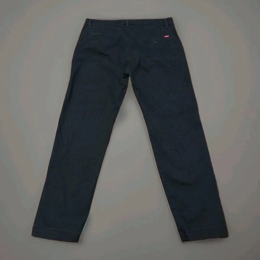Levi's XX Chino Standard Taper Pants Men 34x30 Black Stretch Twill Flat Lay 17x2